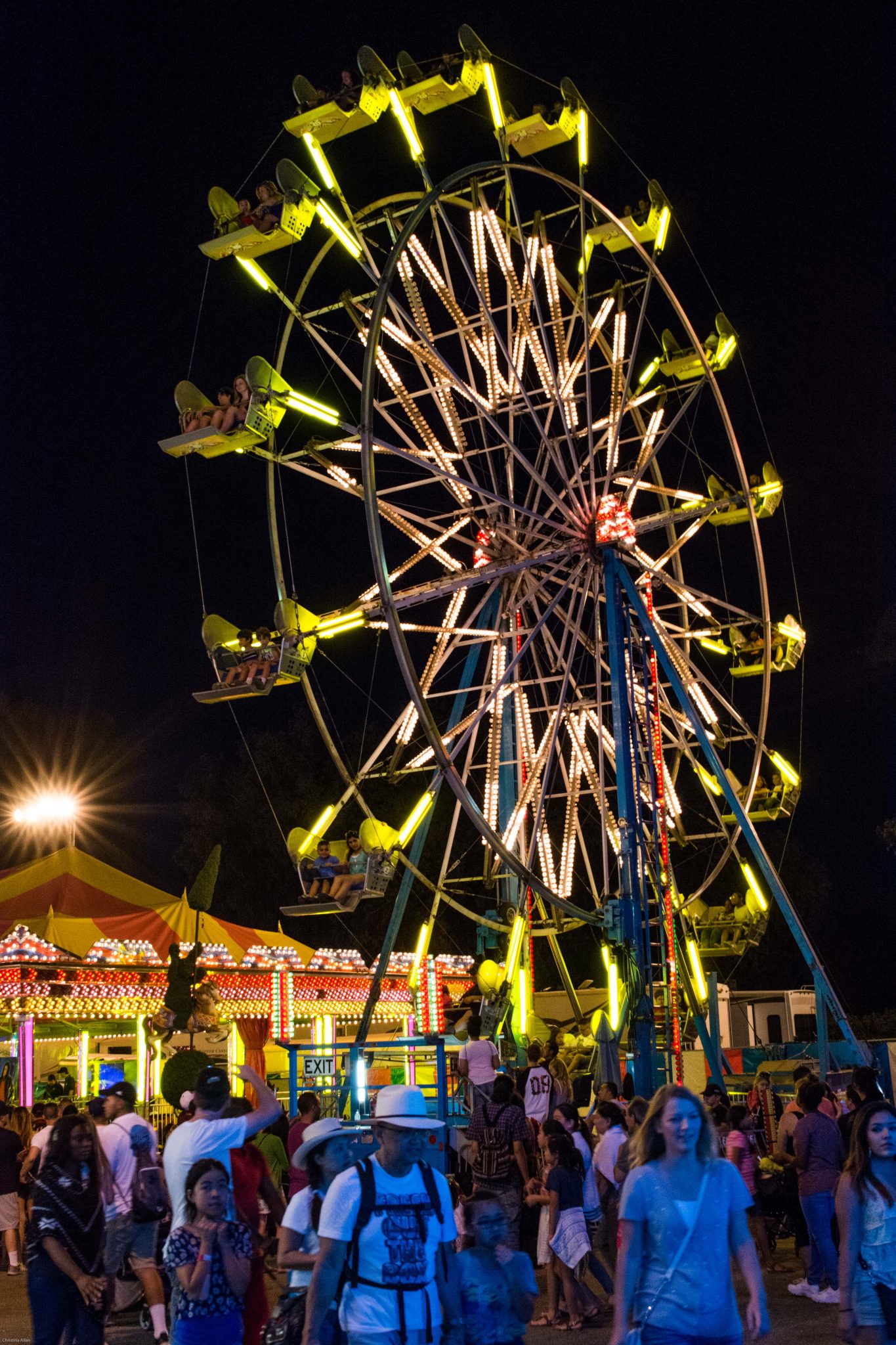 Ferris wheel and crowd at night california state fair sacramento allan