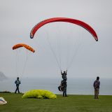 Paragliders orange miraflores cliffs Peru-6105
