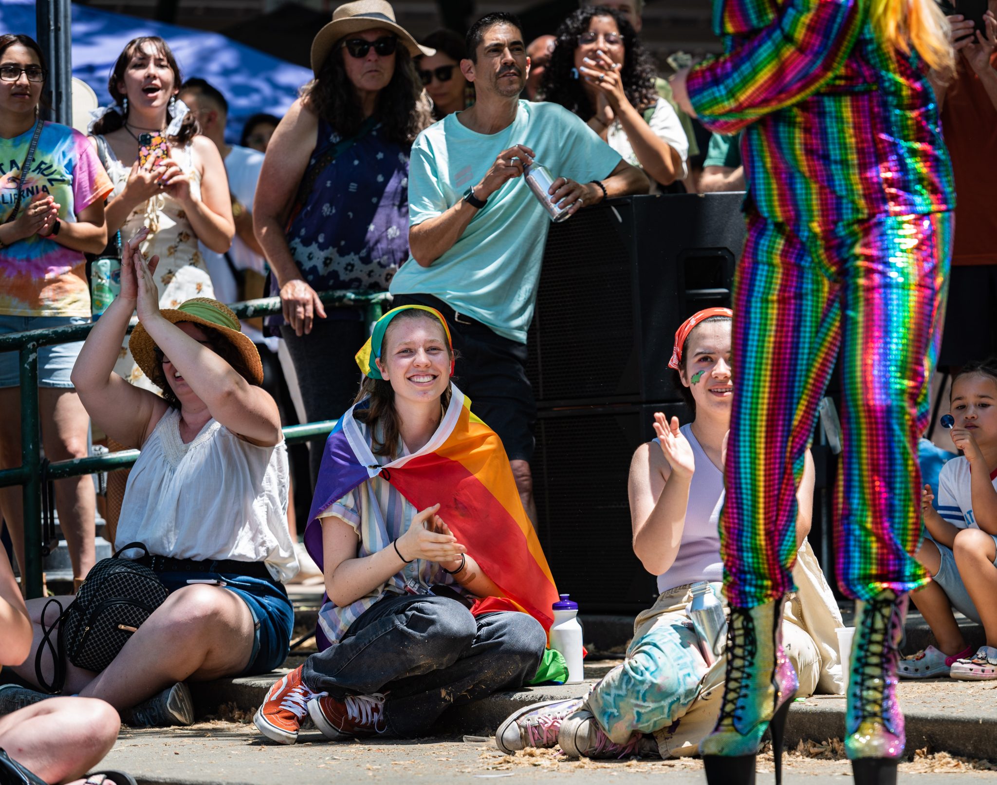 girl with rainbow flag, cape, davis pride, davis, california, pride month, gay community, event, chris allan, freelance photojournalist, news photography, lgbtq, event, colorful