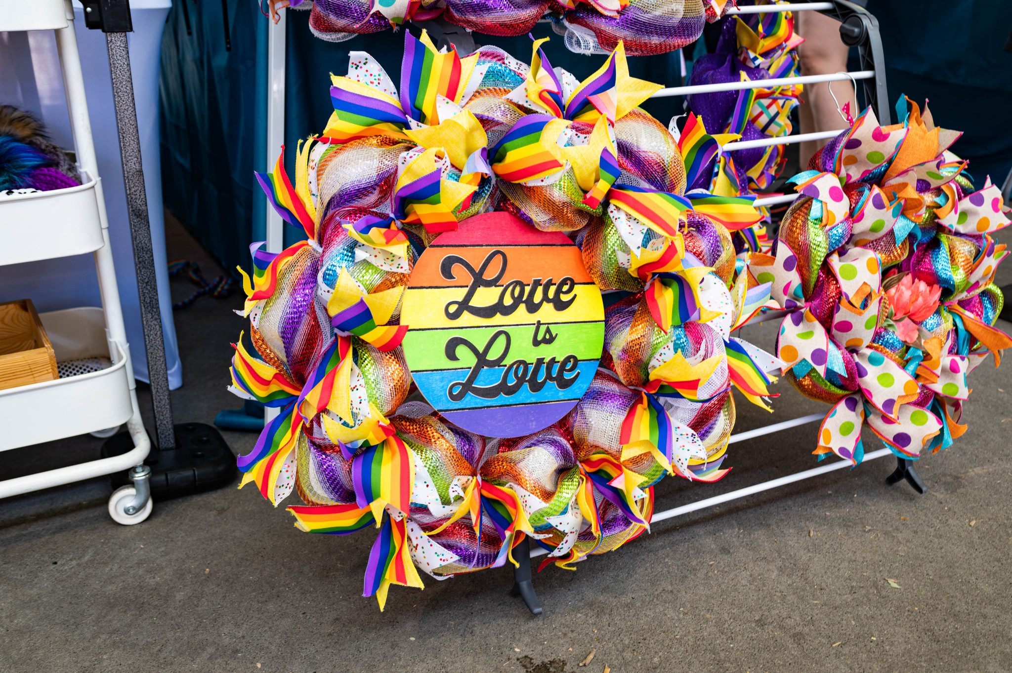 love is love, rainbow, button, display, ribbons, fair, festival, davis pride, davis, california, pride month, gay community, event, chris allan, freelance photojournalist, news photography, lgbtq, event, colorful