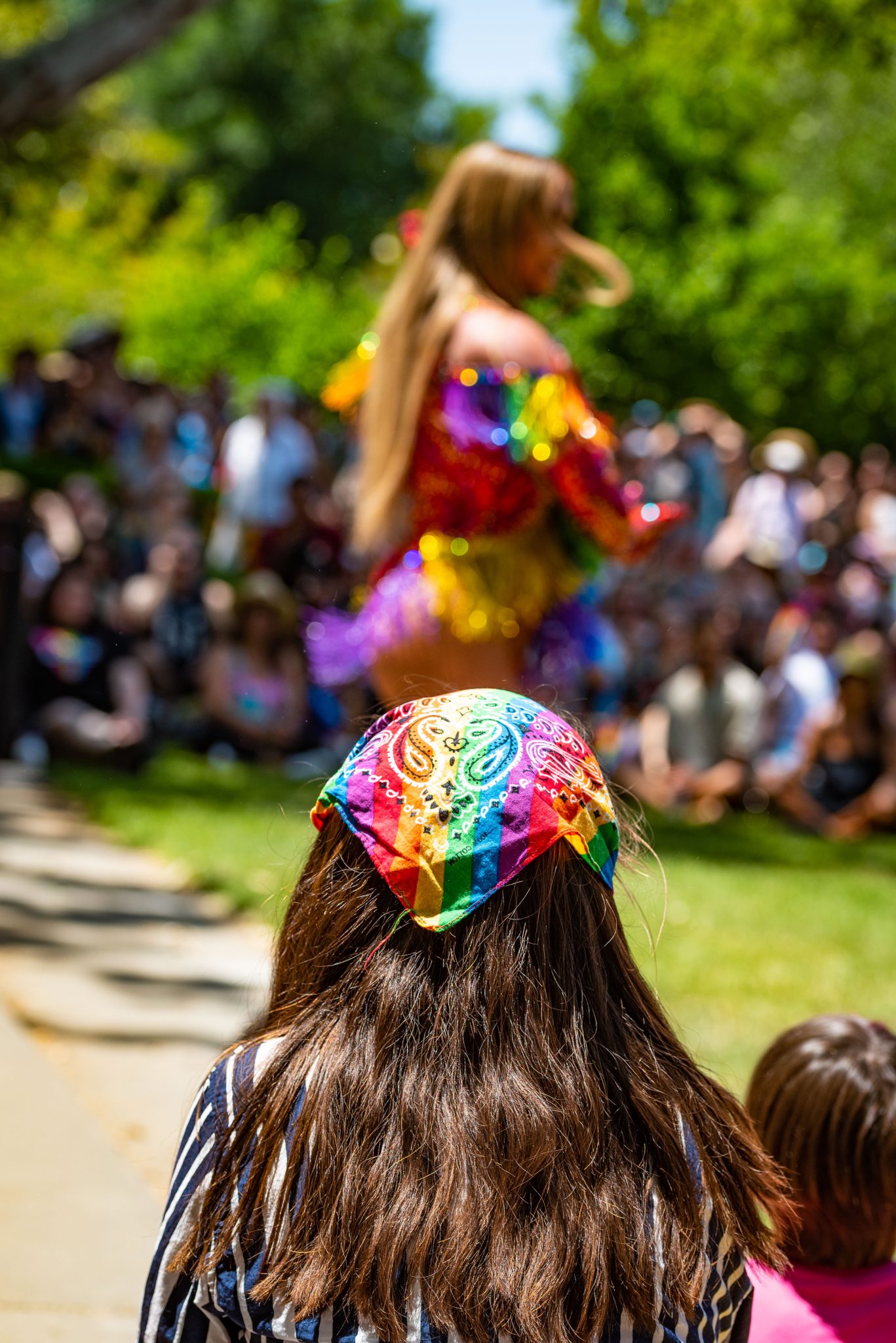 rainbow kerchief, back of person, davis pride, davis, california, pride month, gay community, event, chris allan, freelance photojournalist, news photography, lgbtq, event, colorful