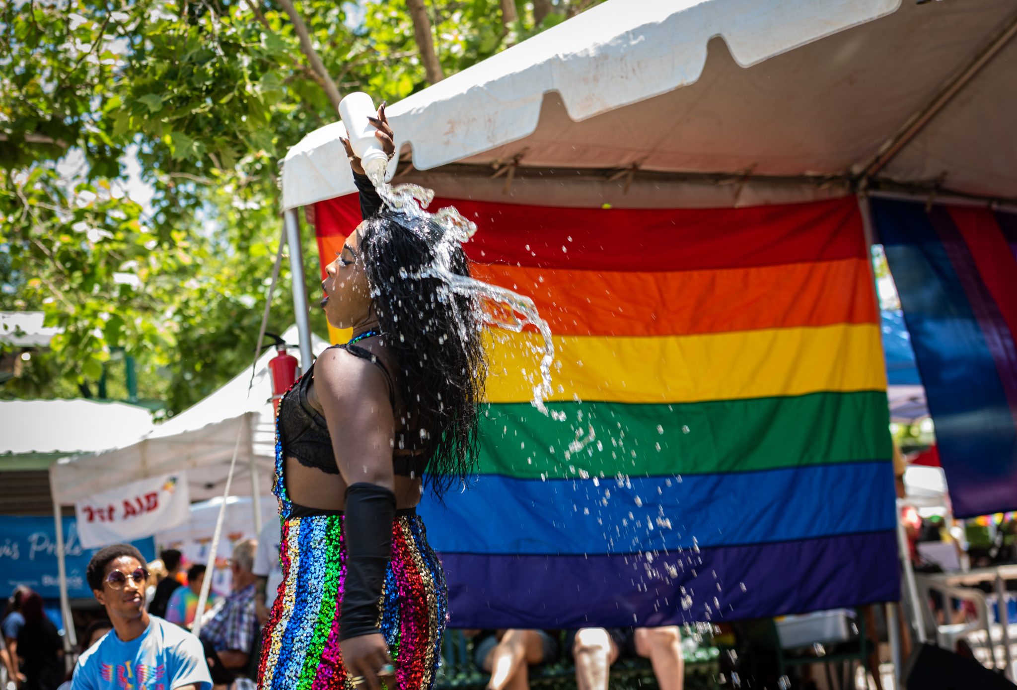 Xena CyberGoth, pouring water on herself, davis pride, davis, california, pride month, gay community, event, chris allan, freelance photojournalist, news photography, lgbtq, event, colorful