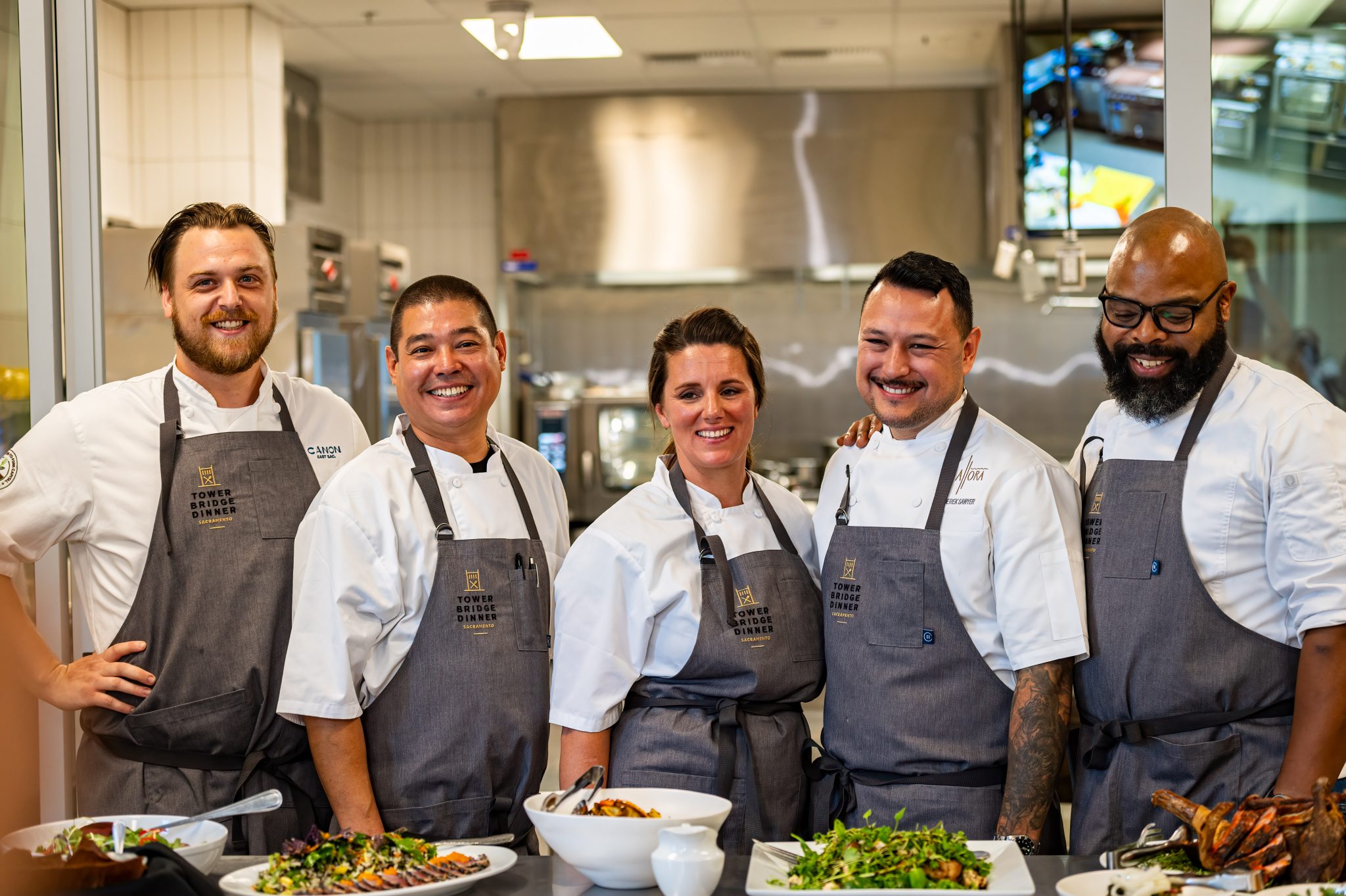 Sean Rummery, Craig Takehara, Rebecca Campbell, Derek Sawyer, Dennis Sydnor, group, friends, fun, smiling, group, posed, Farm to fork festival, sacramento, california, gourmet food, chefs, men and woman, people of color, uniforms, friends, fun, happy, cooks, preview dinner