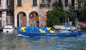 venice photography, venice photos, travel photos, lesbian photographer, gay photographer, Blue and yellow bags, transport boat, Venice Italy