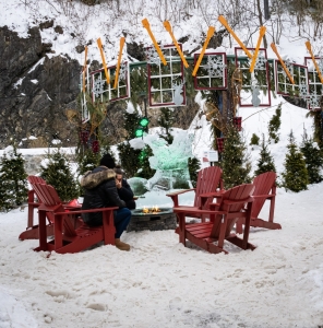 Quebec city, quebec, chris allan, travel photography, freelance, outdoor firepit, people, red adirondack chairs, snow, winter