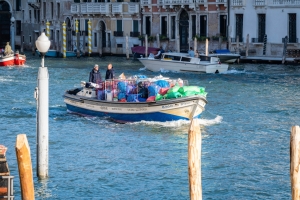 venice photography, venice photos, travel photos, lesbian photographer, gay photographer, Trash boat grand canal Venice italy