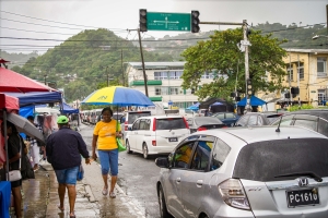 Woman-walking-with-umbrella-Castries-Saint-Lucia-4417-